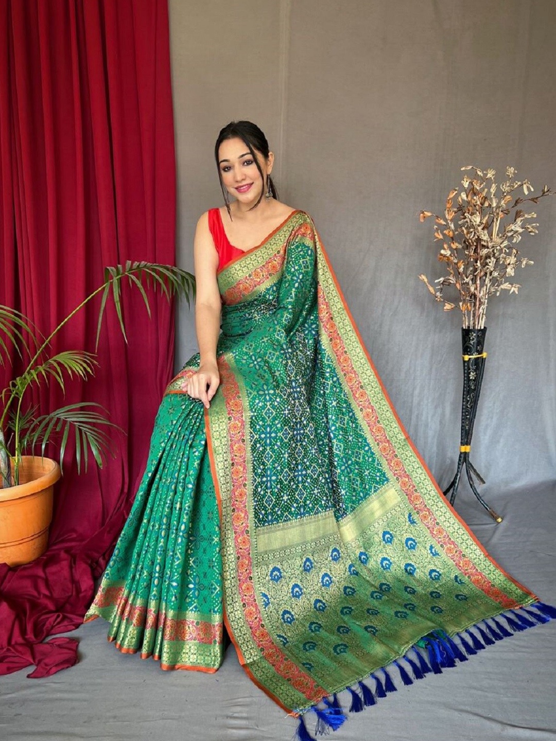 

Mitera Floral Woven Design Zari Patola Saree, Green