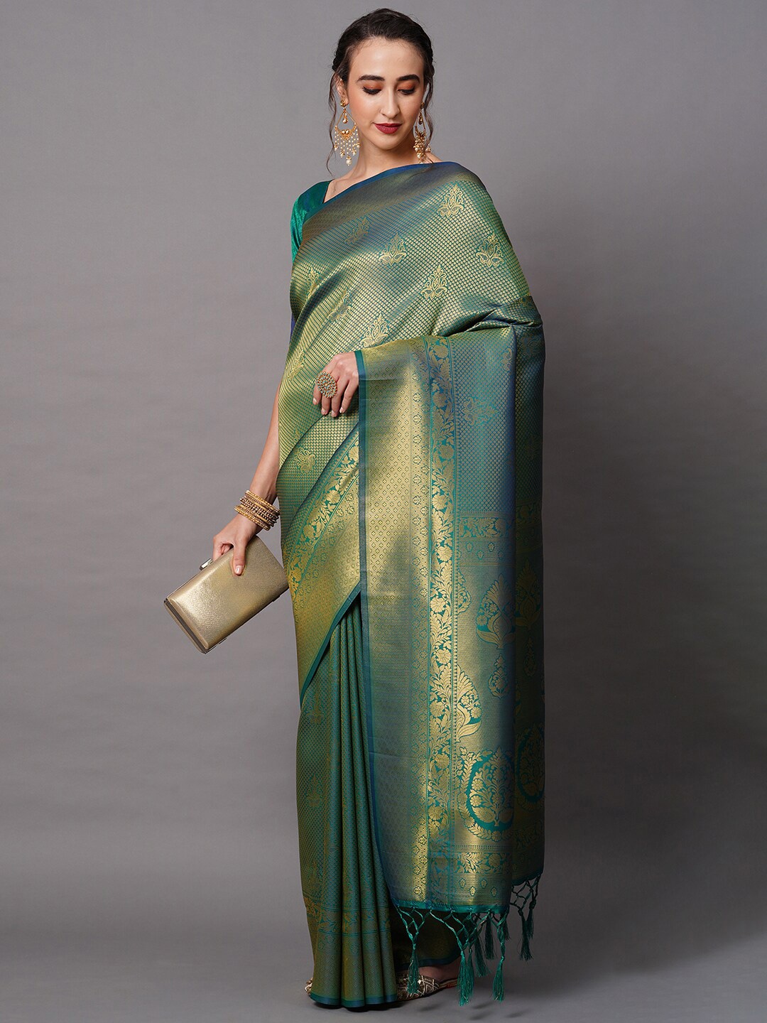 

Anouk Teal Green Ethnic Motifs Woven Design Zari Banarasi Saree