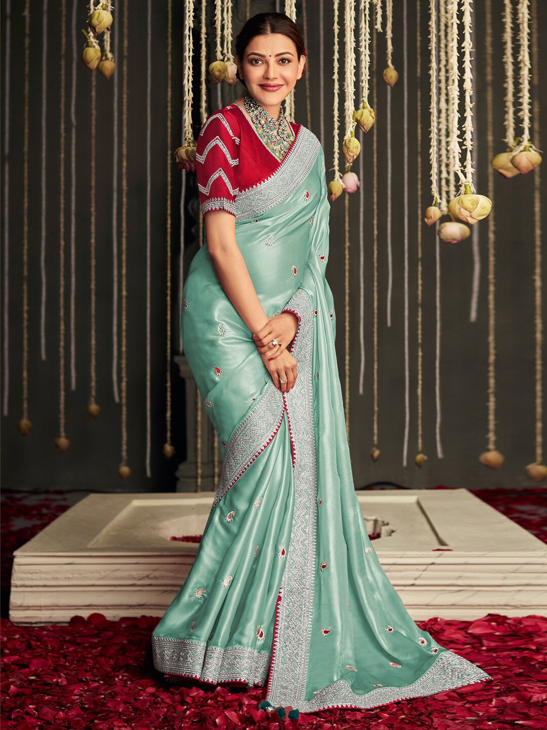 

Anouk Turquoise Blue Paisley Embellished Satin Saree