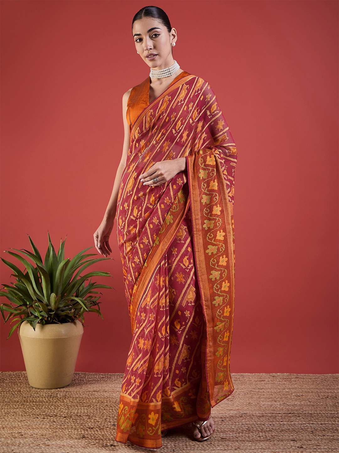 

Anouk Ethnic Motifs Brasso Patola Saree, Rust