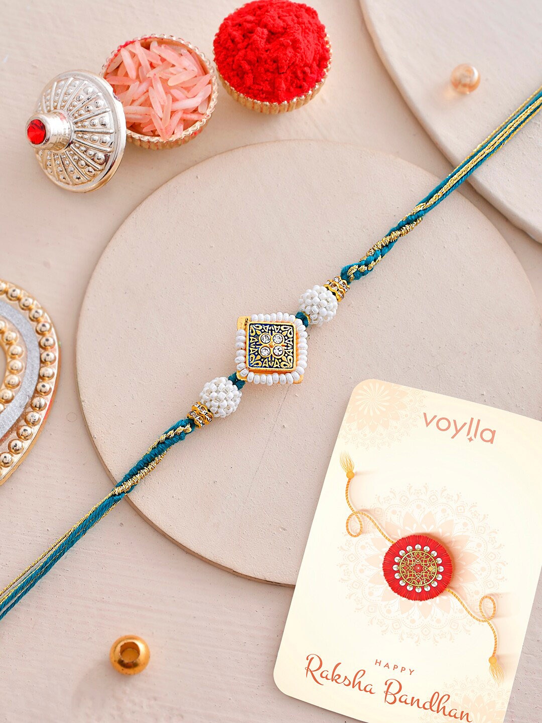 

Voylla Men Pearls Embellished Thread Rakhi, White