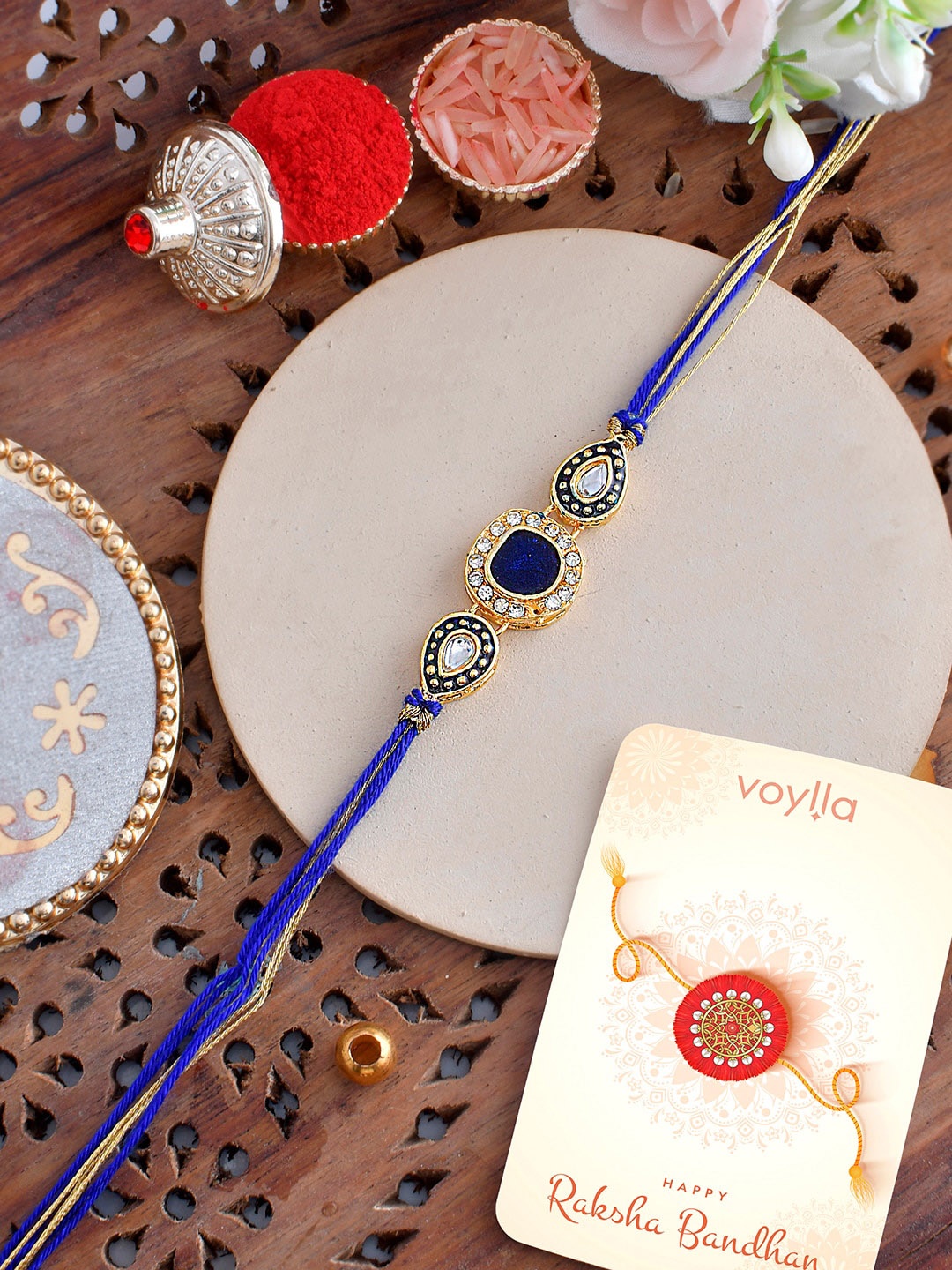 

Voylla Men Kundan Thread Rakhi, Blue