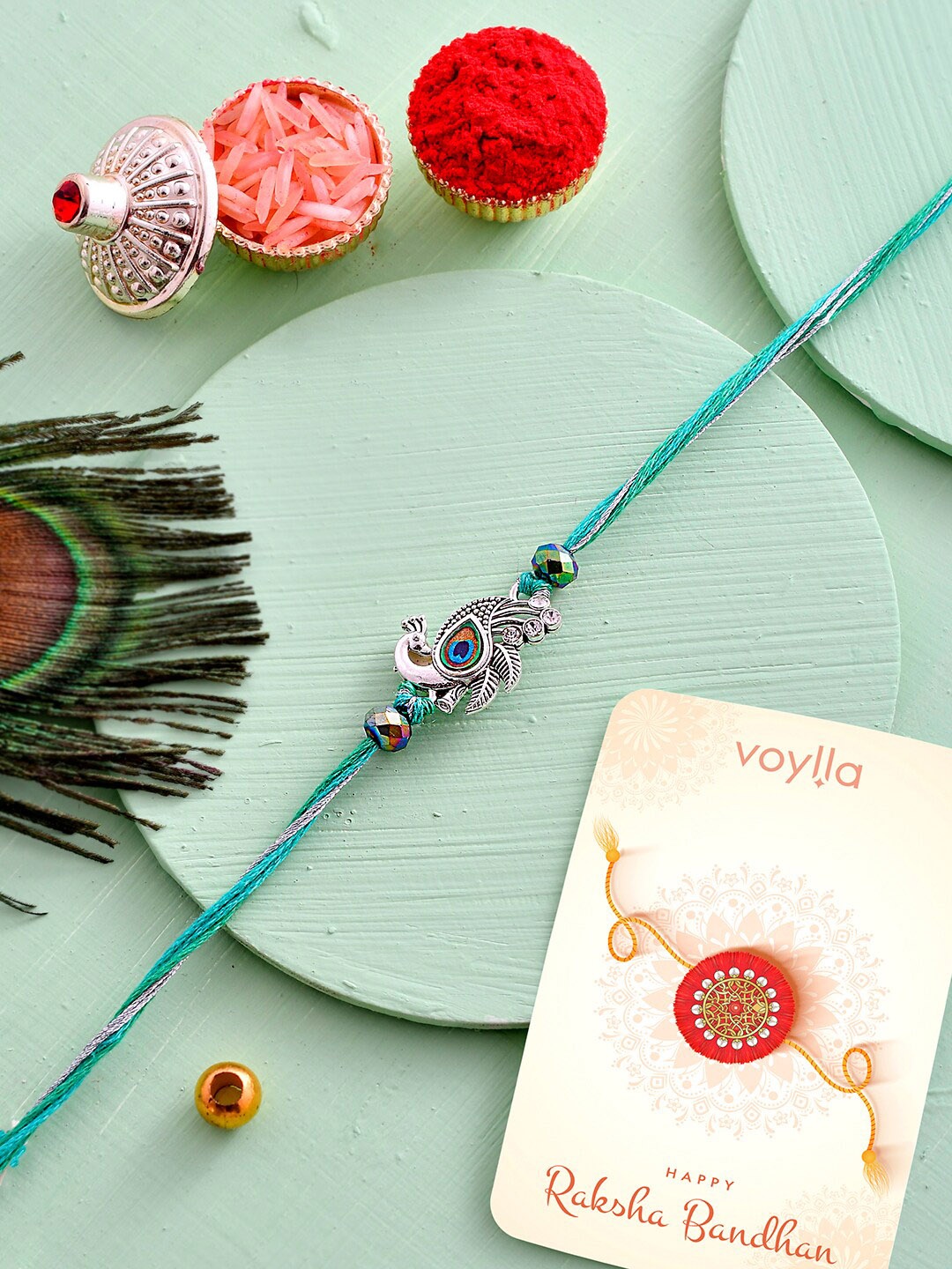 

Voylla Men Lord Krishna Motifs Rakhi, Turquoise blue