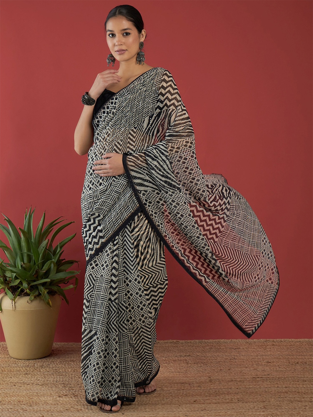 

Anouk White Abstract Printed Sequinned Pure Georgette Saree
