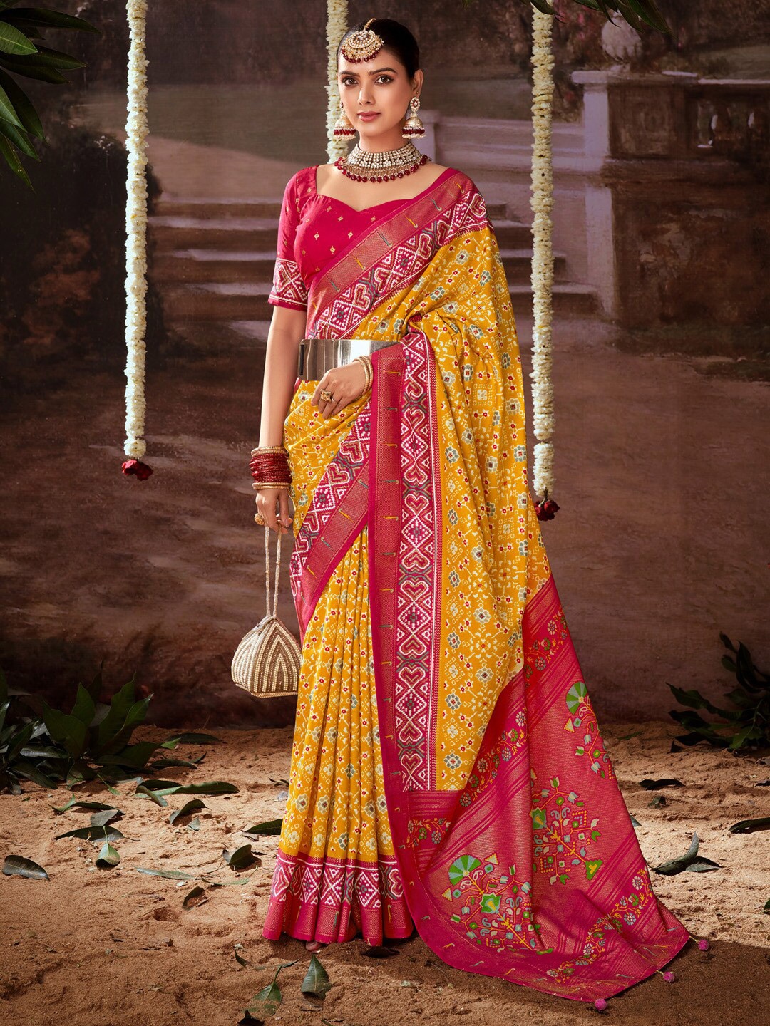 

Anouk Yellow Ethnic Motifs Printed Zari Pochampally Saree