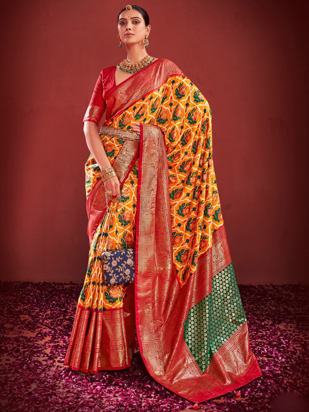 

Anouk Ethnic Motifs Printed Zari Pochampally Saree, Mustard