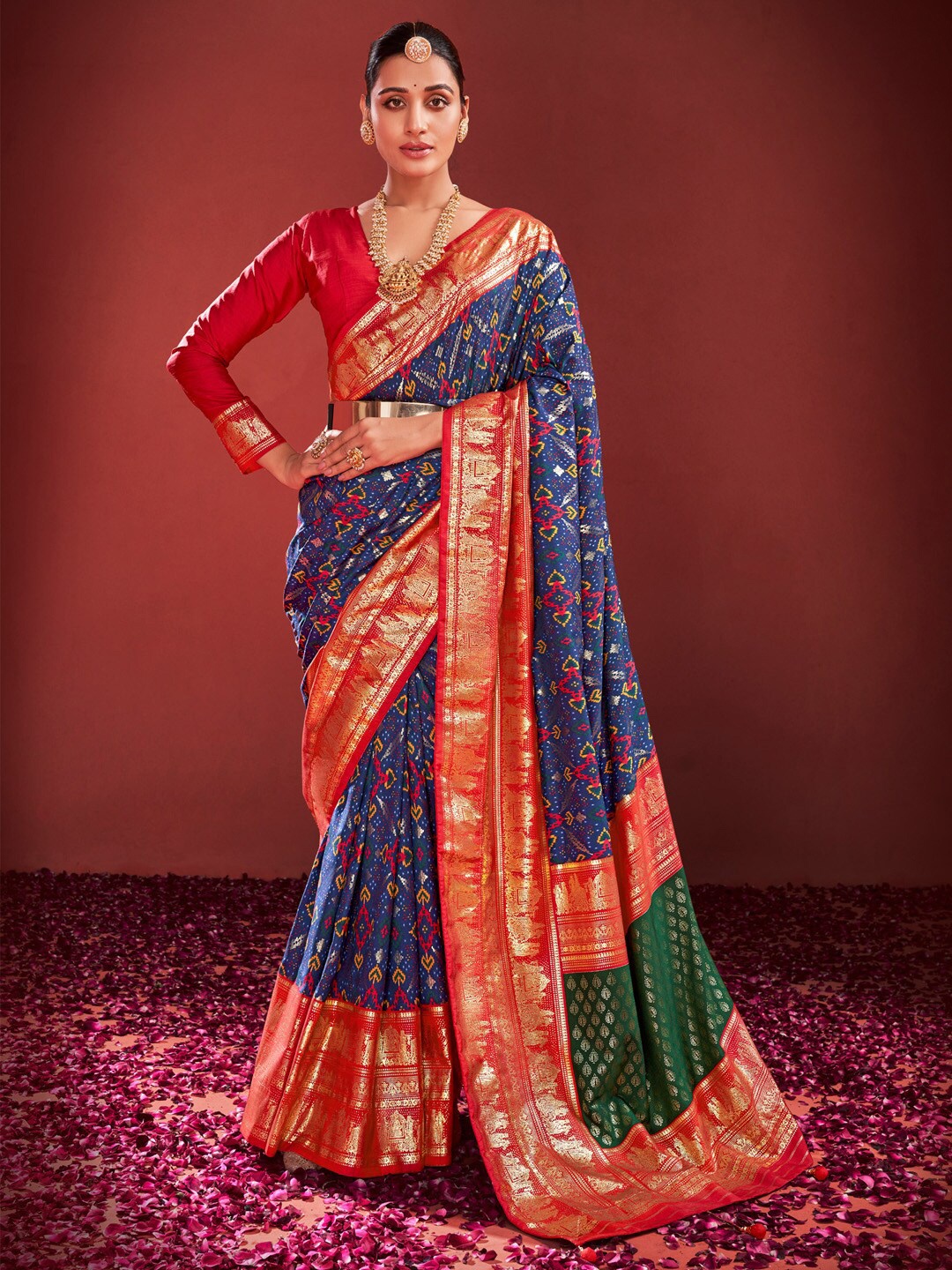 

Anouk Navy Blue Ethnic Motifs Printed Zari Pochampally Saree