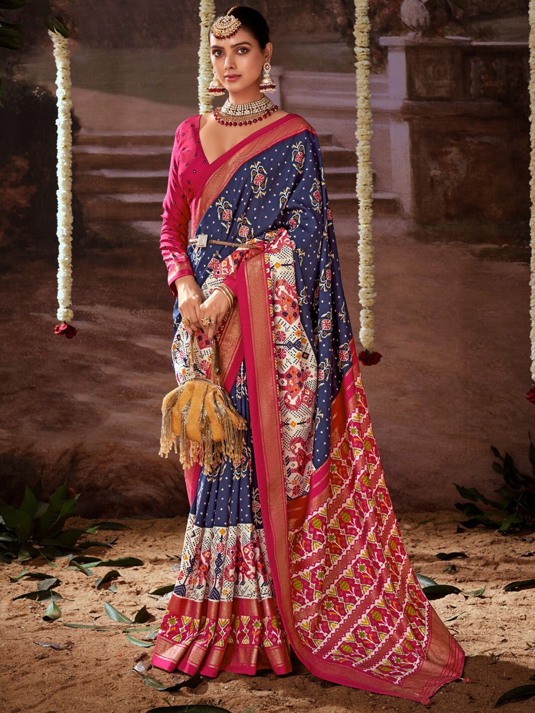 

Anouk Navy Blue Ethnic Motifs Zari Pochampally Saree