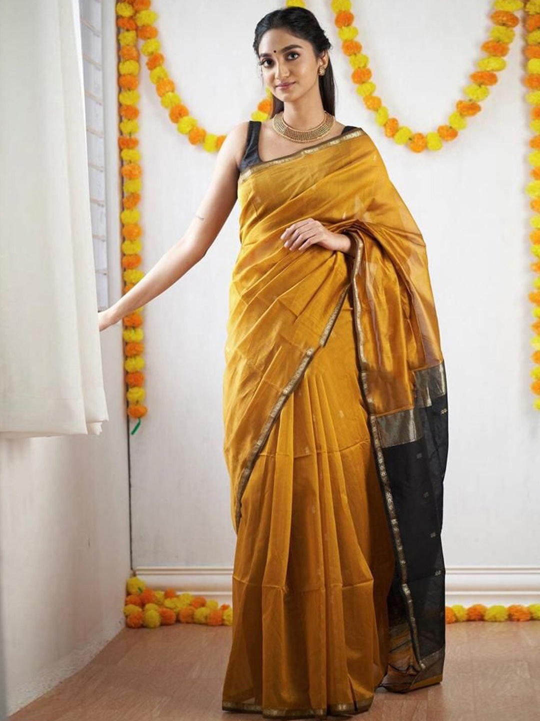 

Anouk Ethnic Motifs Woven Design Zari Banarasi Saree, Mustard
