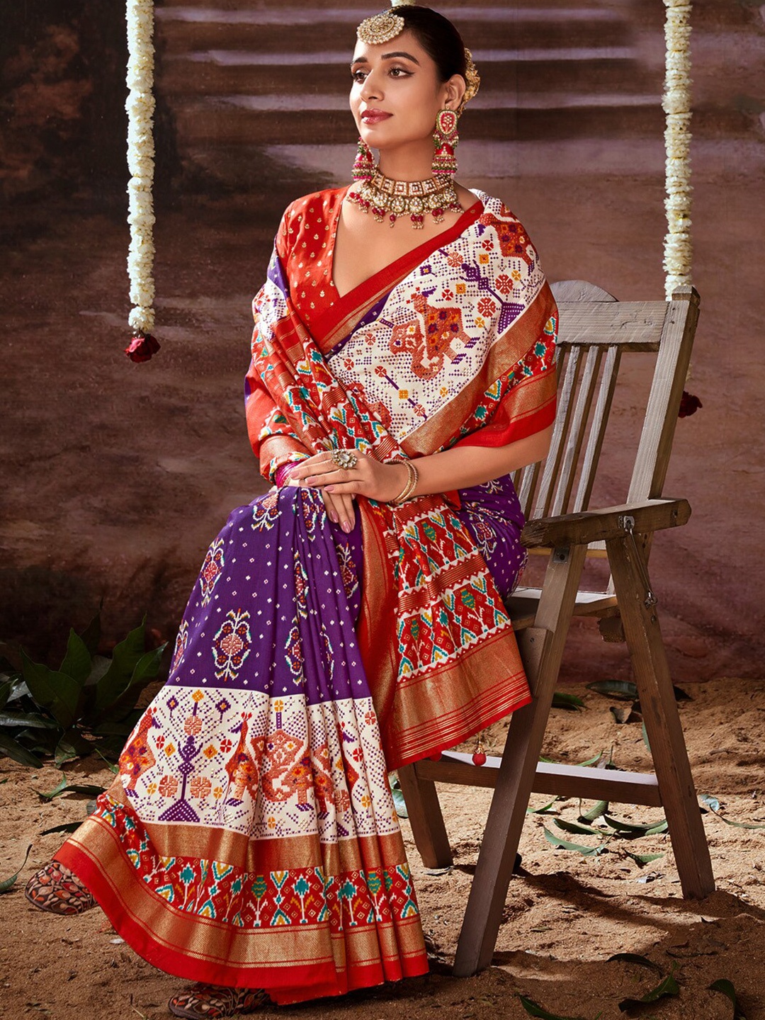 

Anouk Purple Ethnic Motifs Printed Zari Pochampally Saree