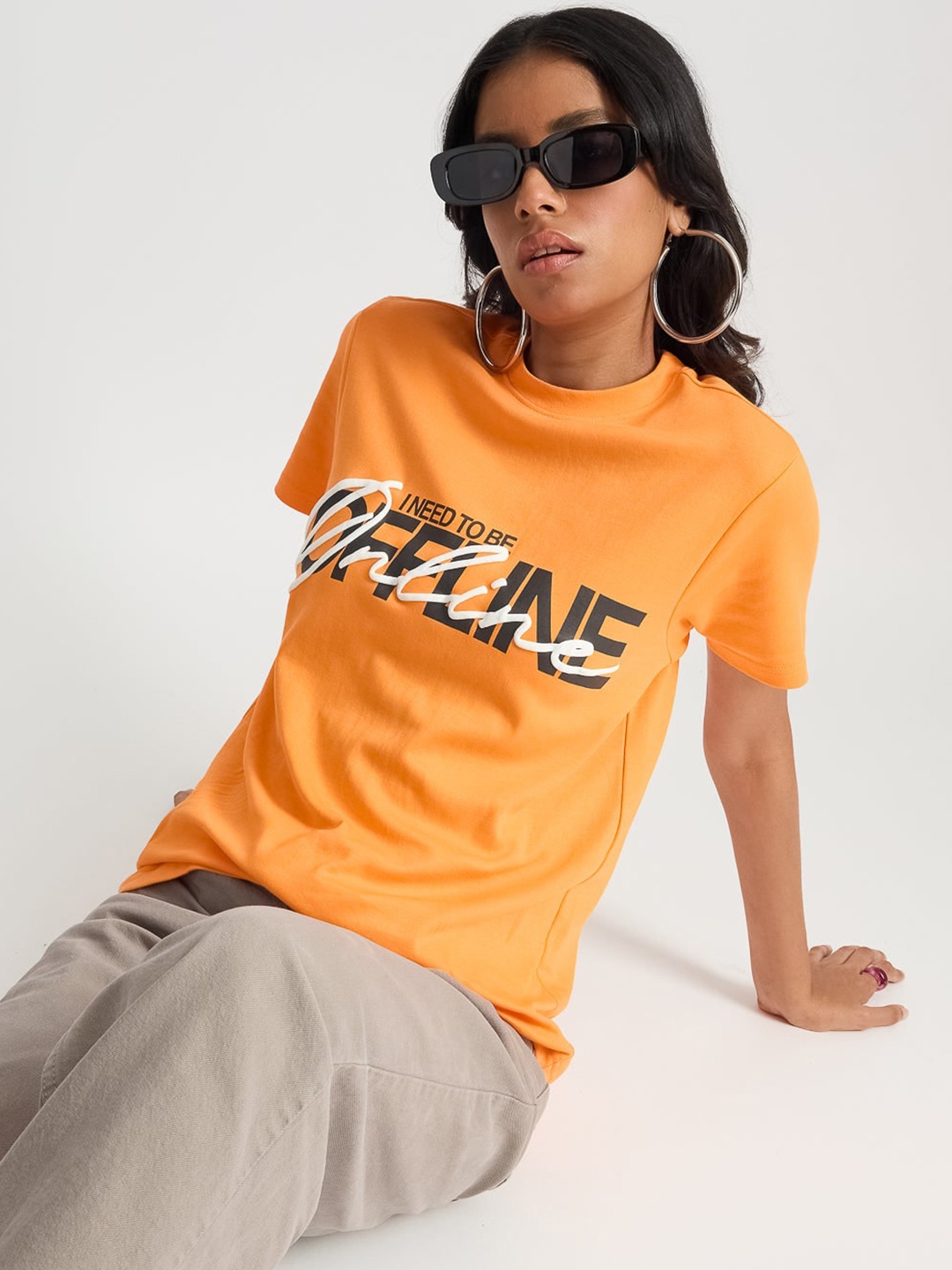

FREAKINS Typography Printed Drop Shoulder Sleeves Pure Cotton T-shirt, Orange