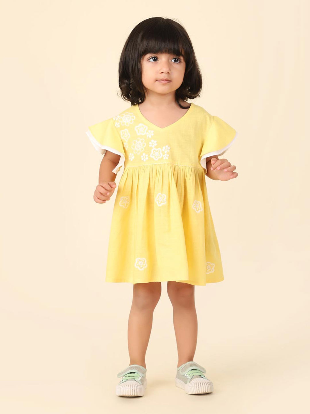 

Fabindia Girls V-Neck Flared Sleeve Cotton A-Line Dress, Yellow