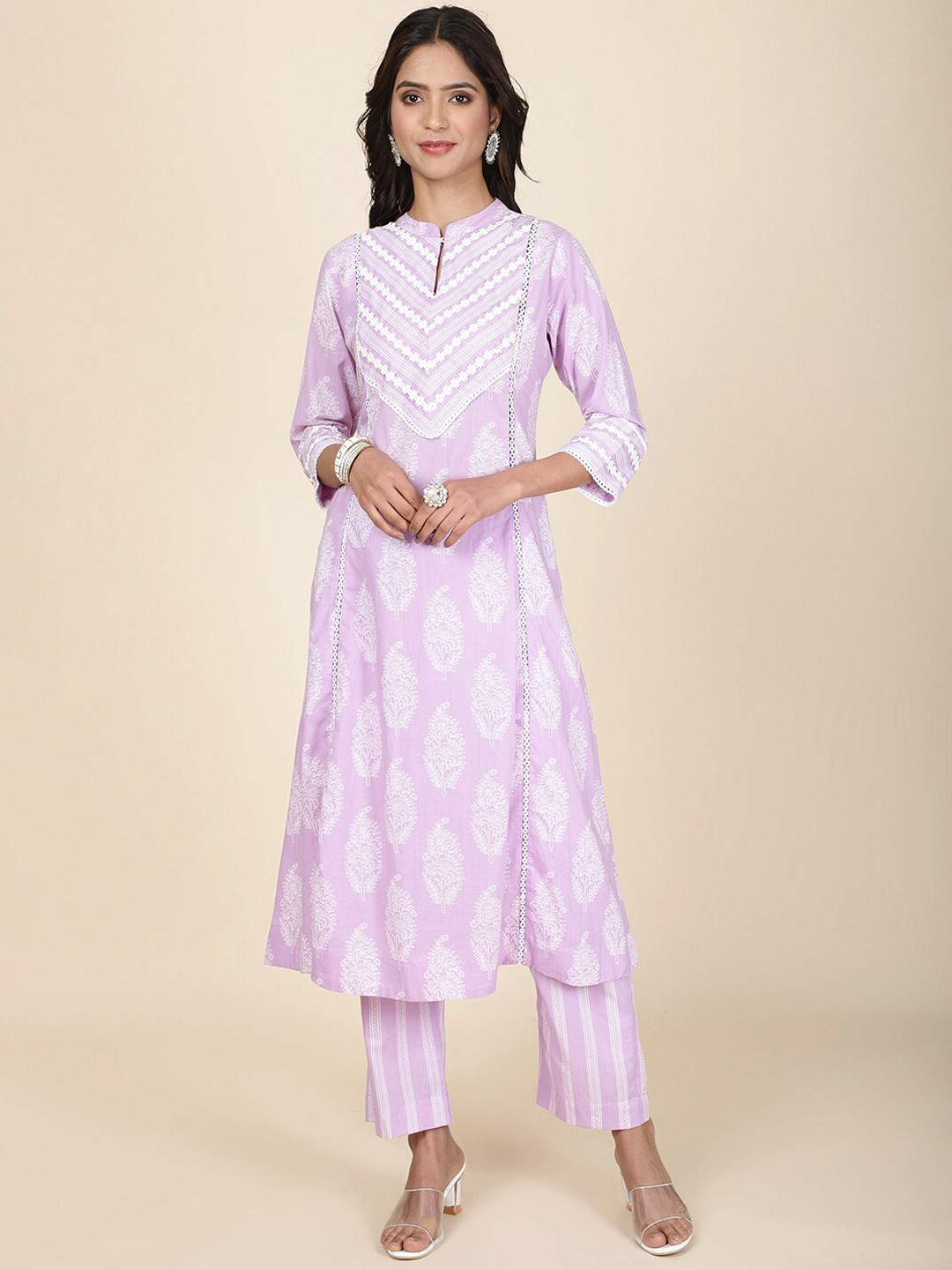 

Meena Bazaar Ethnic Motifs Printed Mandarin Collar Thread Work A-Line Kurta with Trousers, Mauve