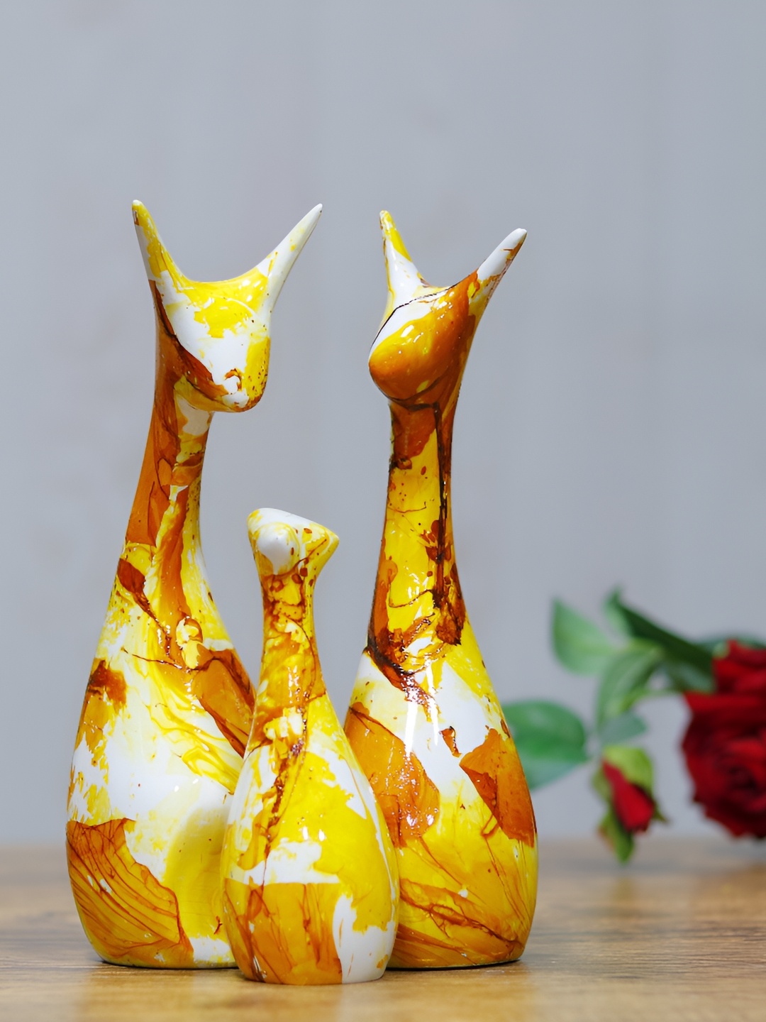 

GW CREATIONS Yellow & Brown 3 Pieces Figurine Decorative Showpiece