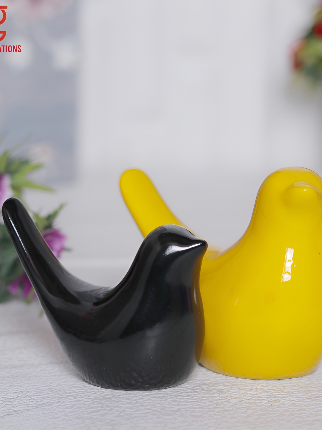 

GW CREATIONS Yellow & Black 2 Pieces Figurine Showpiece