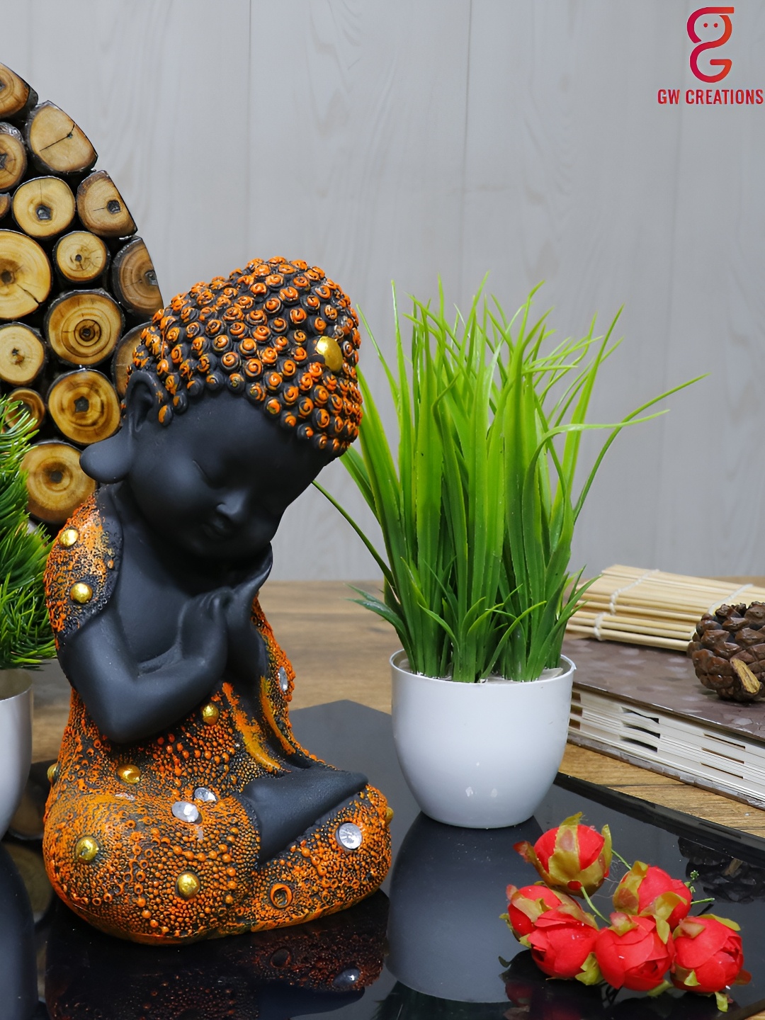 

GW CREATIONS Orange & Black 2 Pieces Buddha Idol With Plant Showpieces