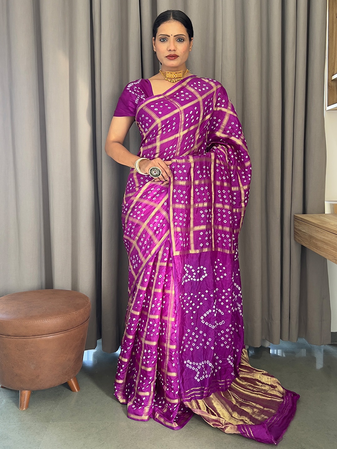 

Anouk Purple Woven Design Zari Bandhani Saree