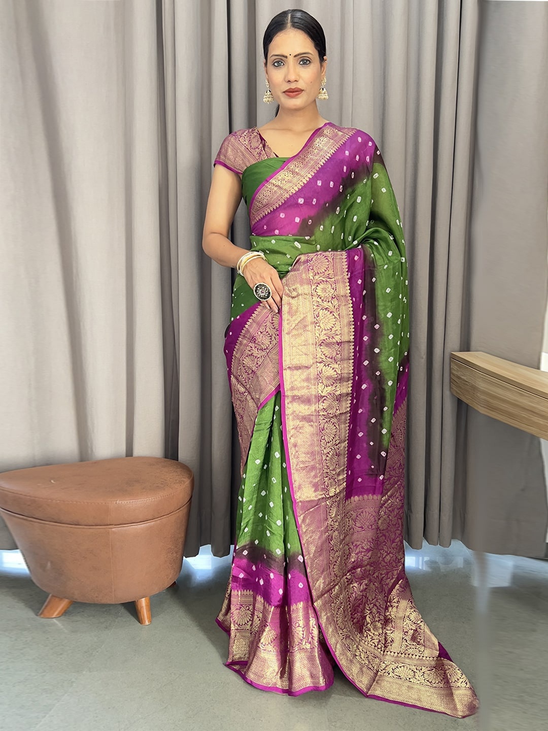 

Anouk Green Woven Design Zari Bandhani Saree