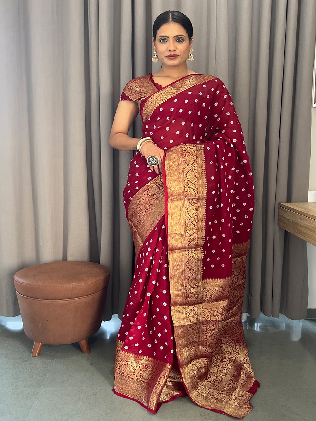 

Anouk Maroon Woven Design Zari Bandhani Saree