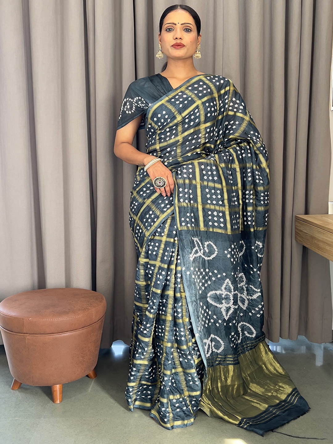 

Anouk Grey & White Woven Design Zari Bandhani Saree