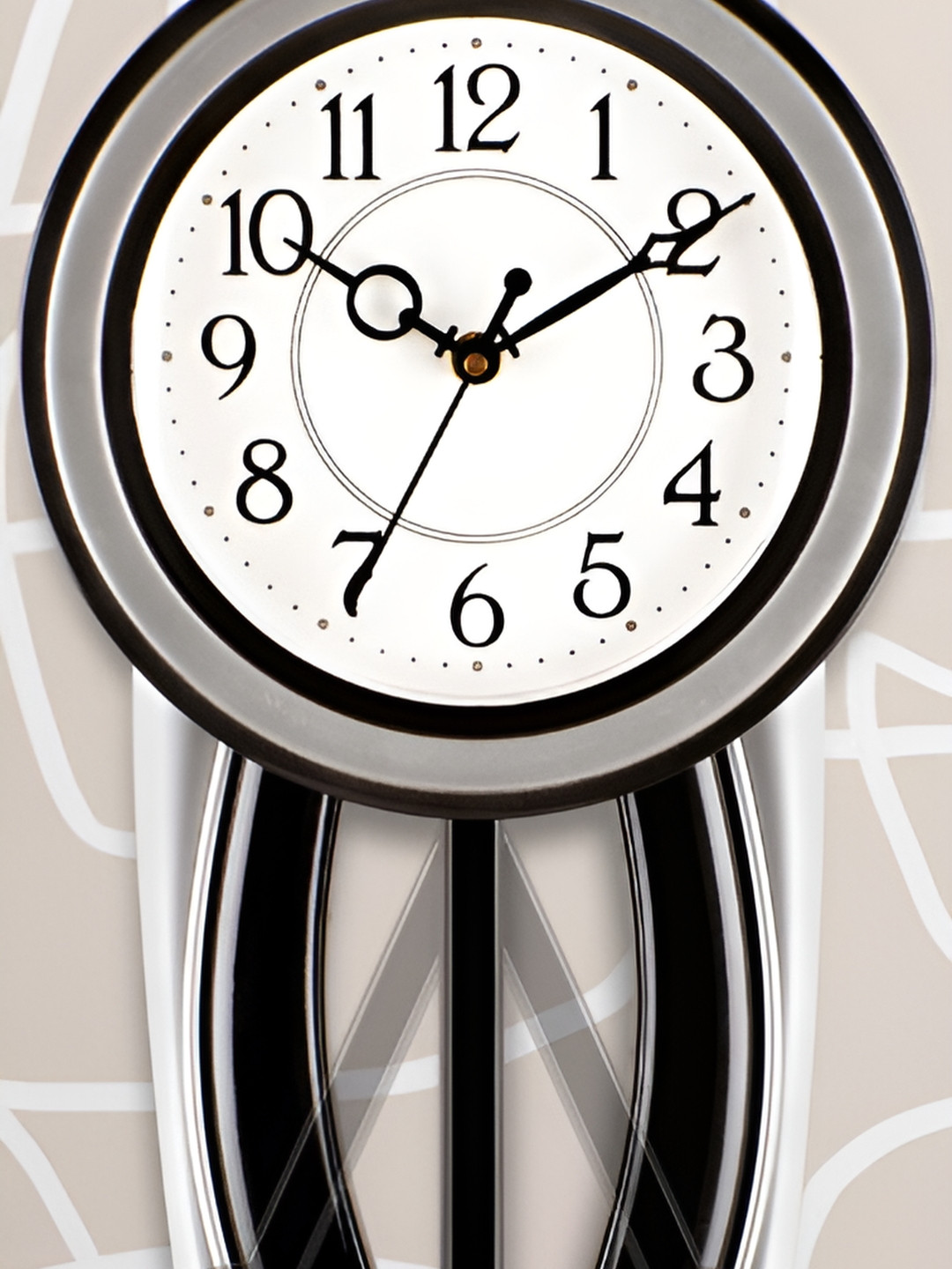 

Attractionz Silver-Toned & Black Round Textured Pendulum Analogue Contemporary Wall Clock