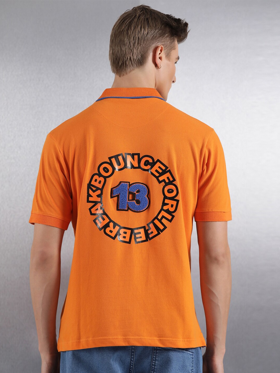 

Breakbounce Orange Typography Printed Cotton Polo Collar T-shirt