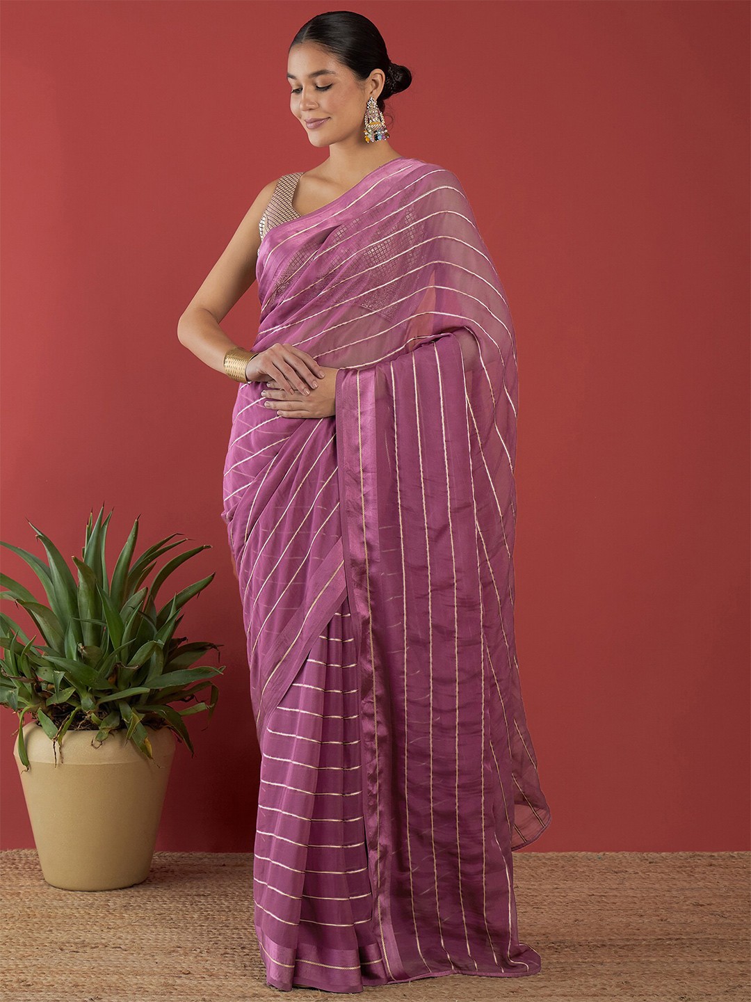 

Anouk Lavender & Gold-toned Striped Saree