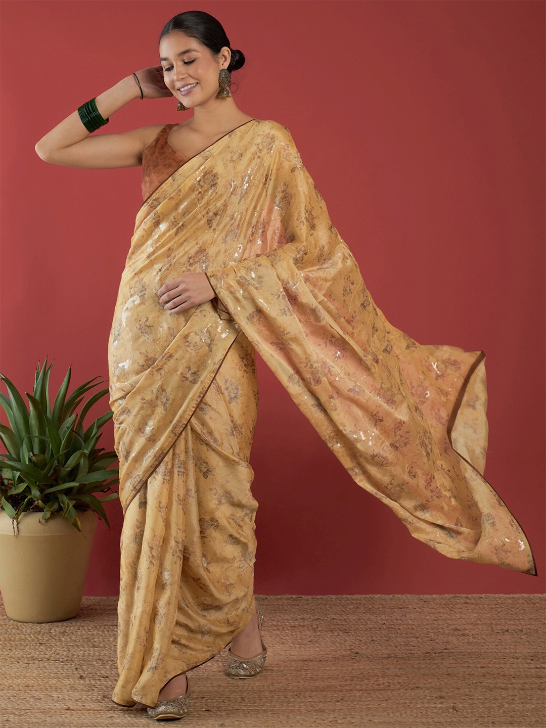 

Anouk Rust & Gold-Toned Floral Printed Embellished Embroidered Brasso Saree
