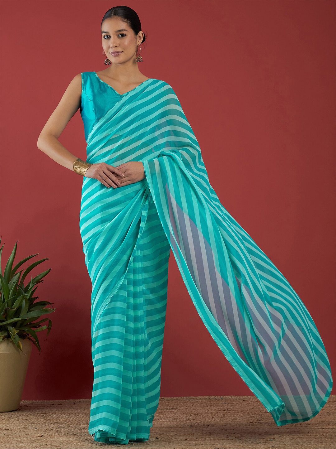 

Anouk Striped Pure Georgette Saree, Blue