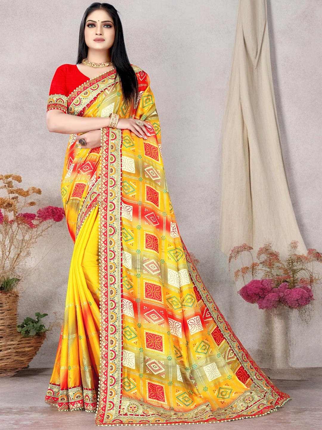 

Ambuja International Foil Printed Embroidered Pure Chiffon Bandhani Saree, Yellow