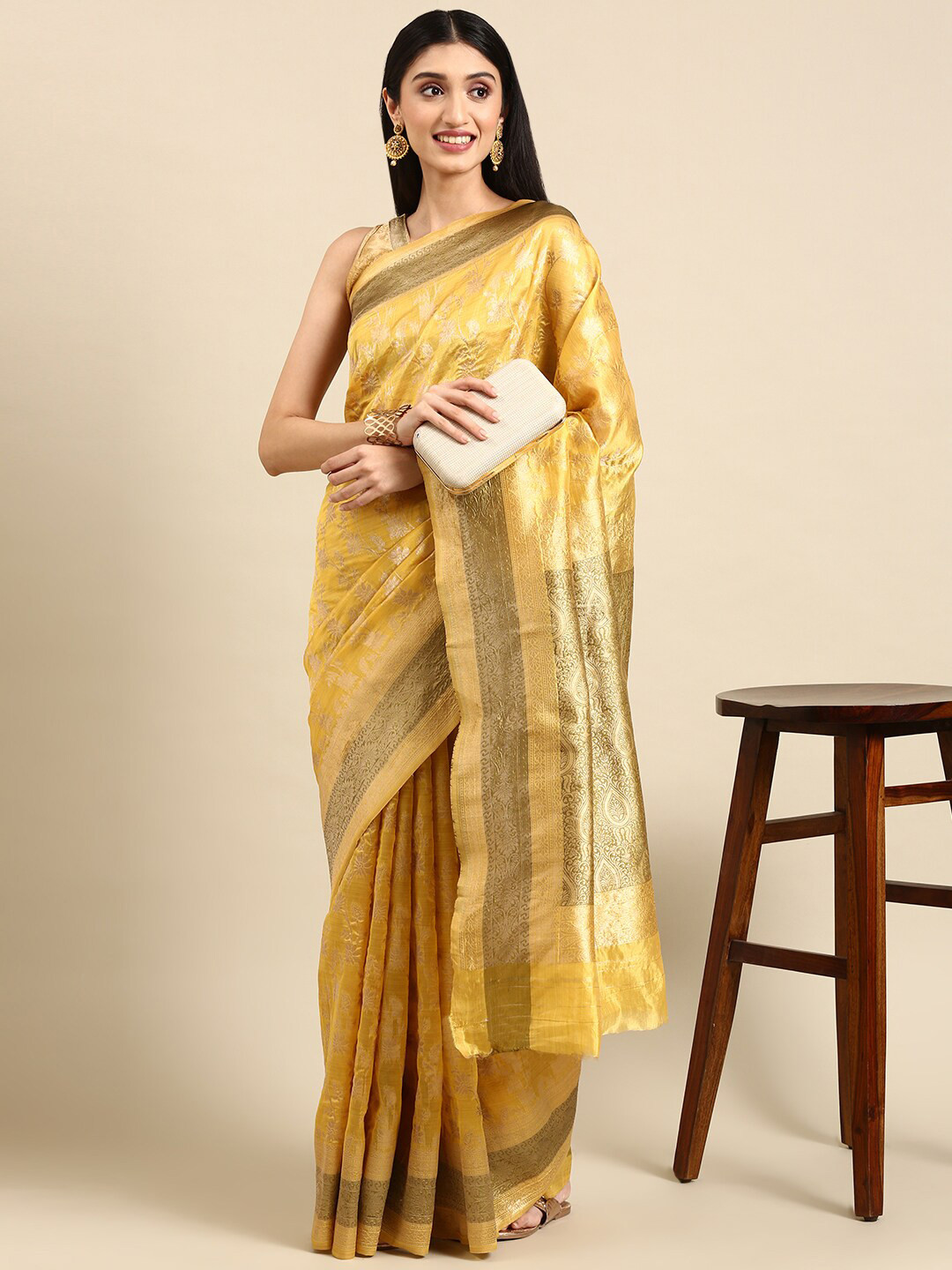 

Civamee Ethnic Motifs Woven Design Zari Organza Banarasi Saree, Yellow