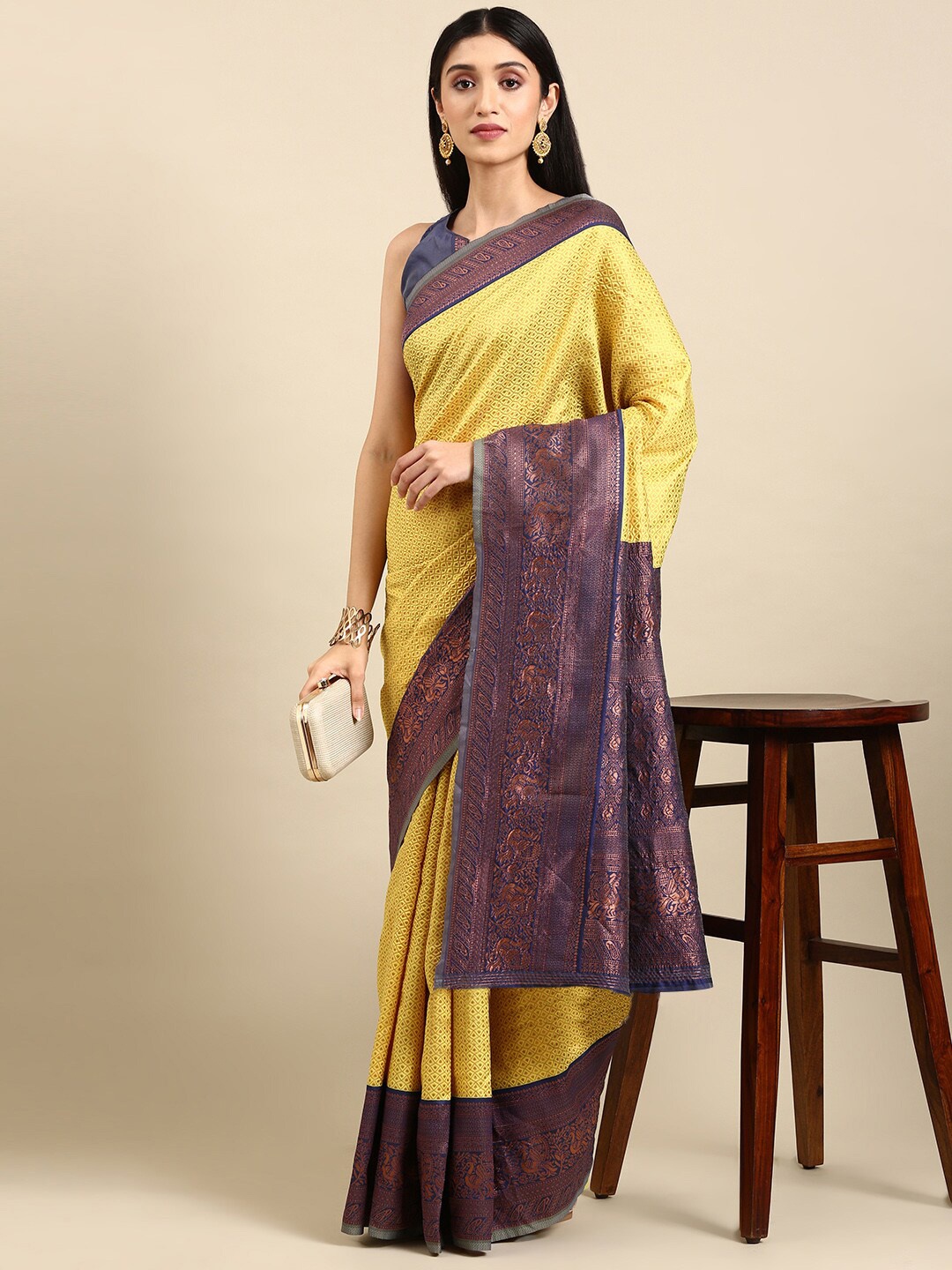 

Civamee Woven Design Zari Art Silk Banarasi Saree, Yellow