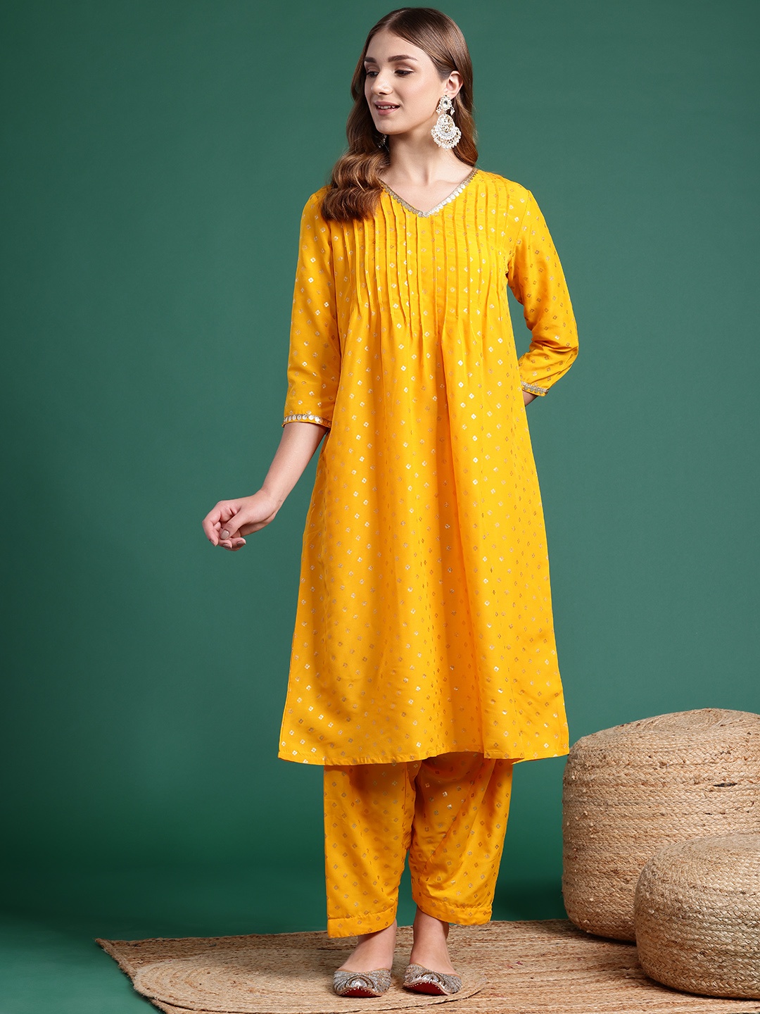 

Sangria Printed Pleated Sequinned Kurta with Salwar, Yellow