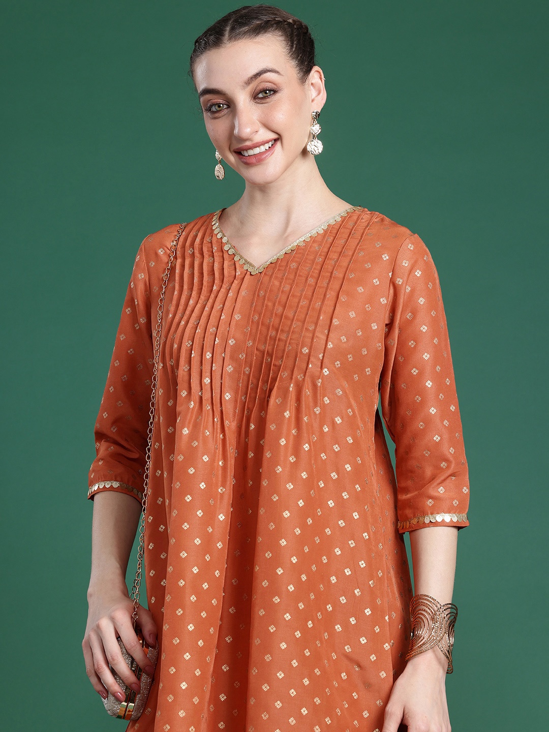 

Sangria Ethnic Motifs Printed V-Neck Regular Thread Work Kurta with Patiala, Orange