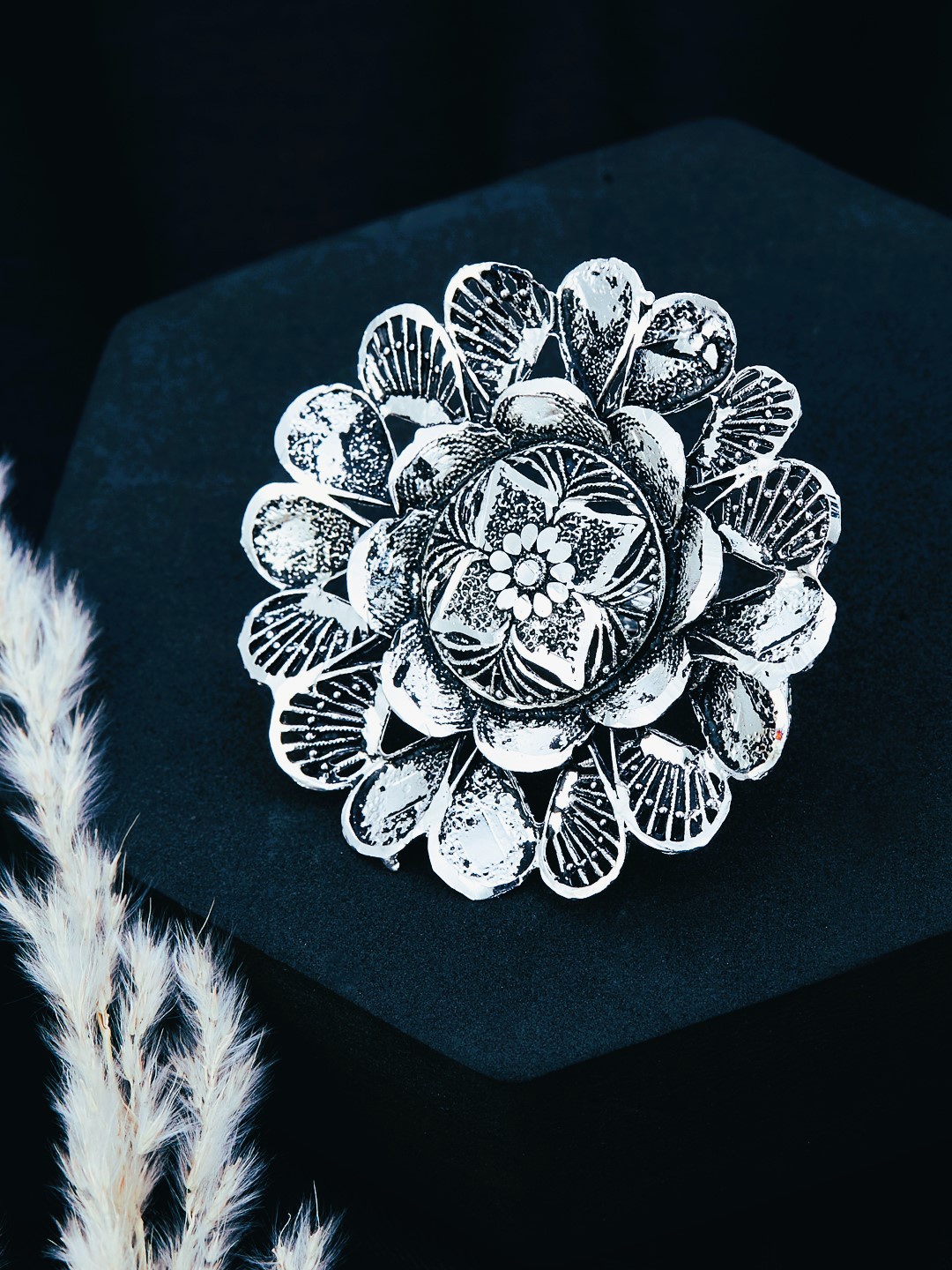 

ATIBELLE German Silver Silver-Plated Floral Textured Adjustable Finger Ring