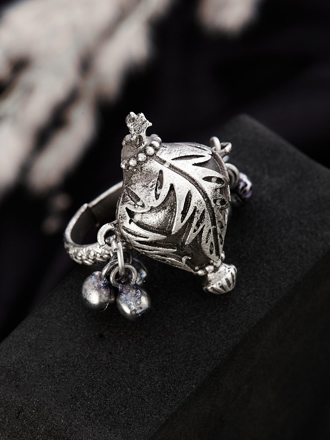 

ATIBELLE German Silver Silver-Plated Floral Textured Adjustable Finger Ring