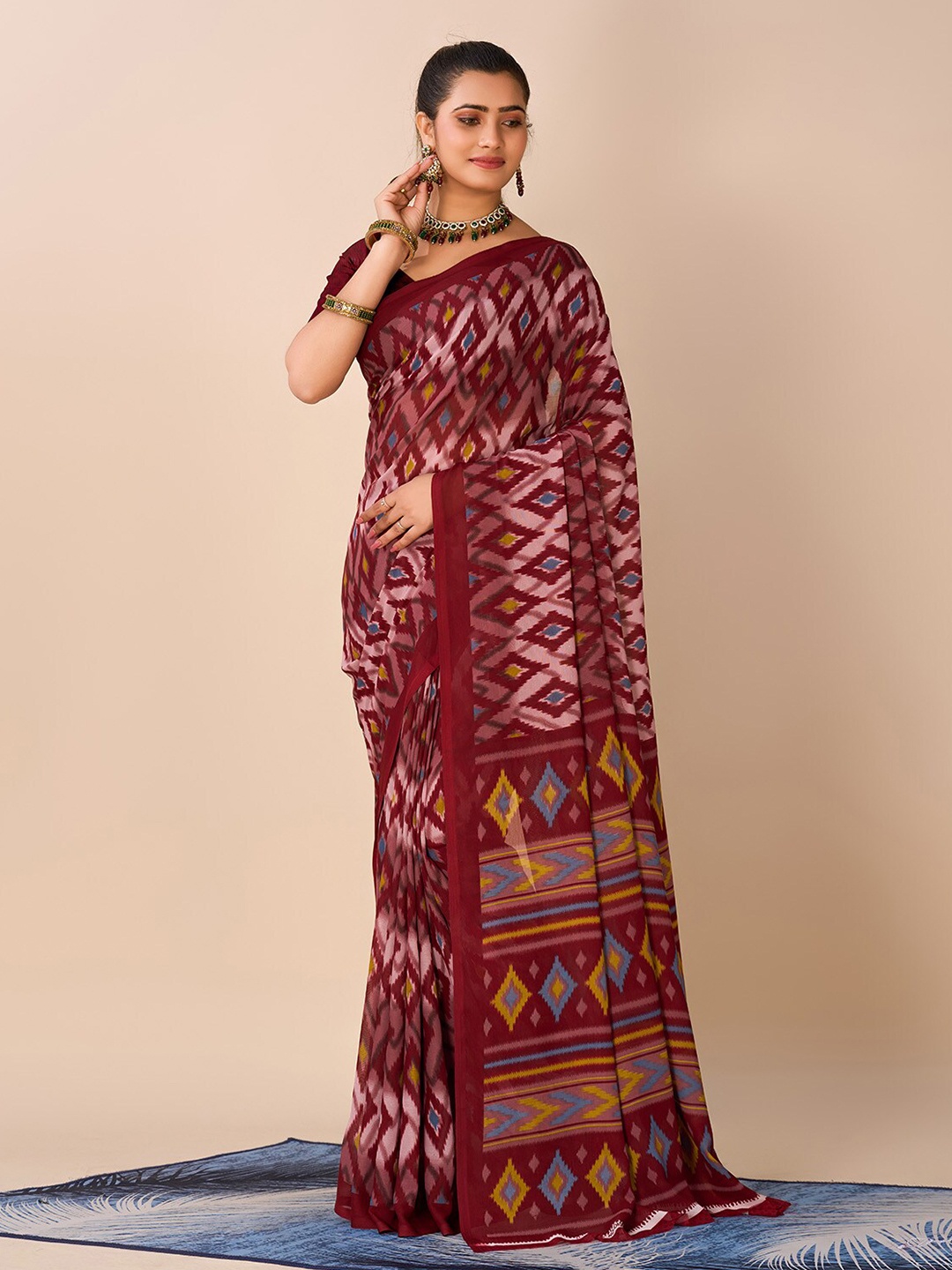 

NIRMAL CREATION Geometric Printed Pure Georgette Saree, Maroon