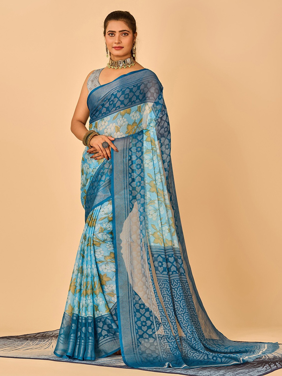 

NIRMAL CREATION Floral Printed Brasso Saree, Blue