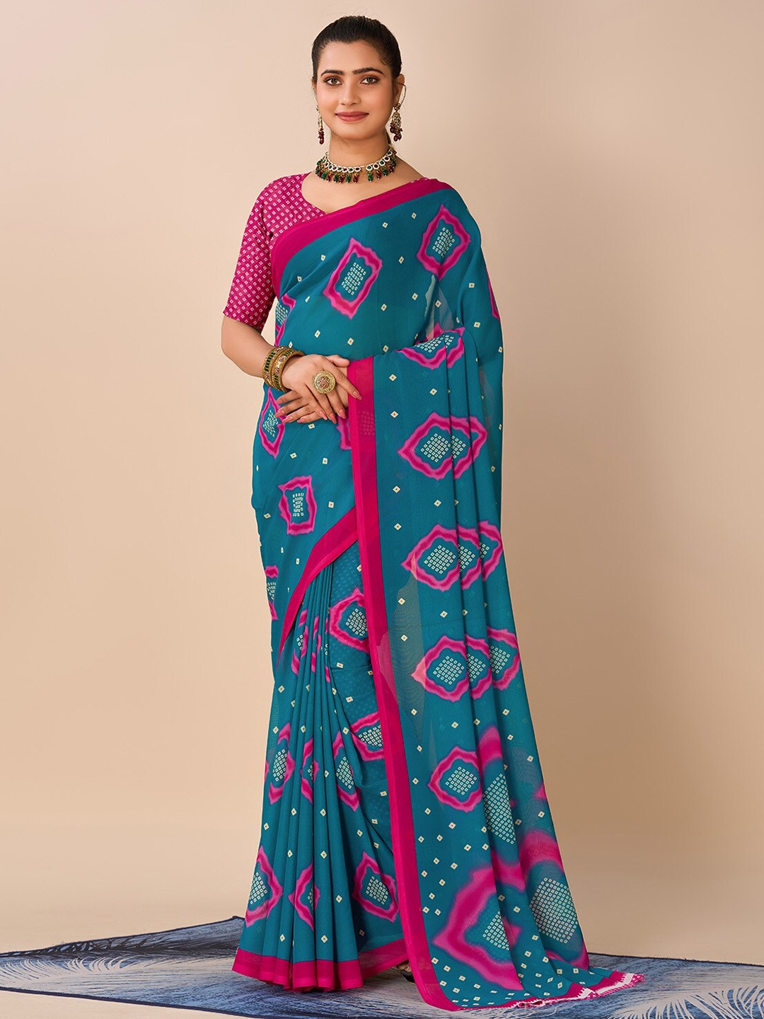 

NIRMAL CREATION Bandhani Pure Georgette Saree, Turquoise blue