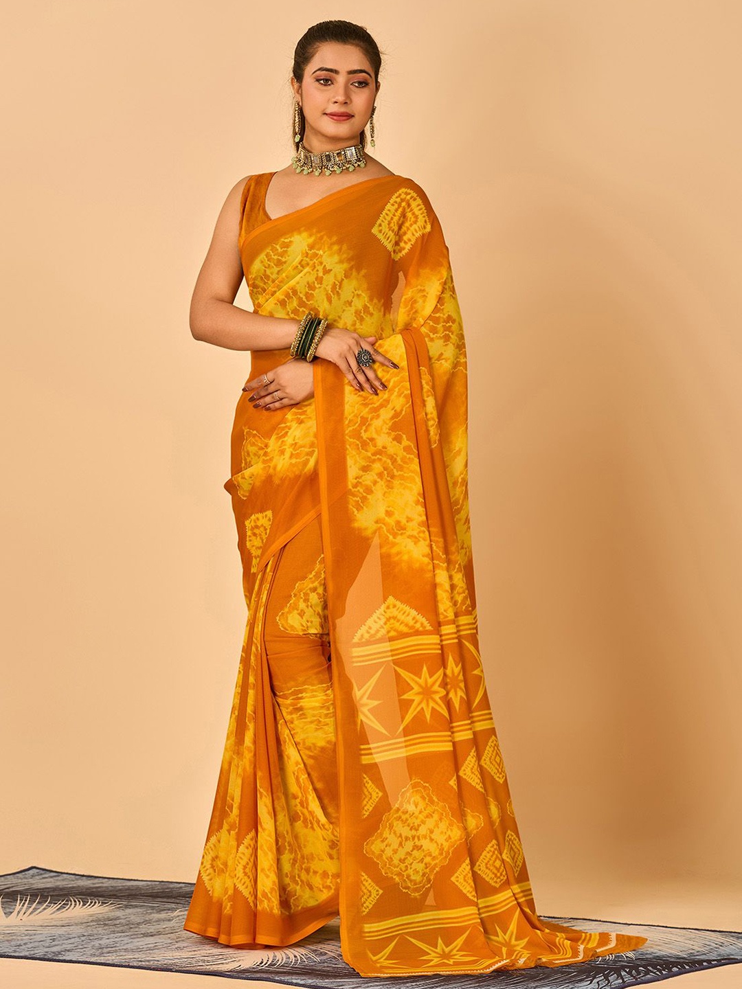 

NIRMAL CREATION Tie & Dye Printed Pure Georgette Saree, Yellow