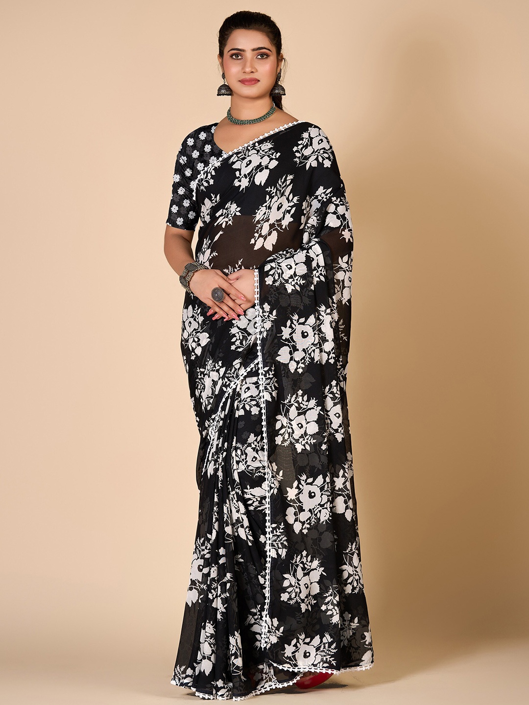 

NIRMAL CREATION Floral Printed Pure Georgette Saree, Black