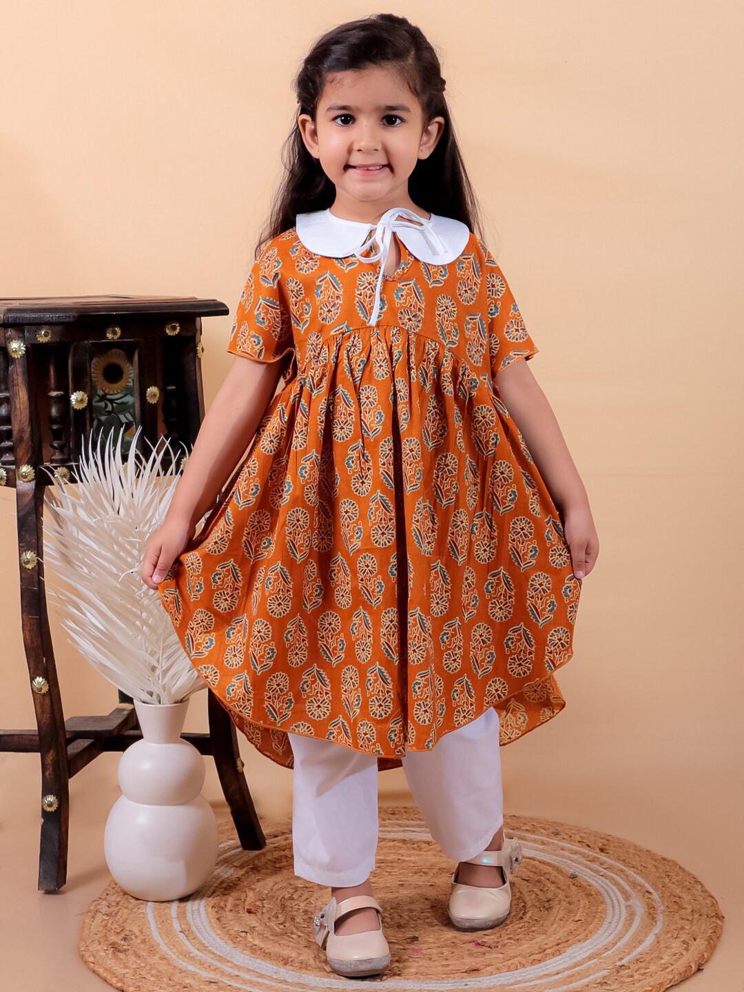 

JUNITOS Girls Ethnic Motifs Printed Peter Pan Collar Pure Cotton Kurta with Trousers, Yellow