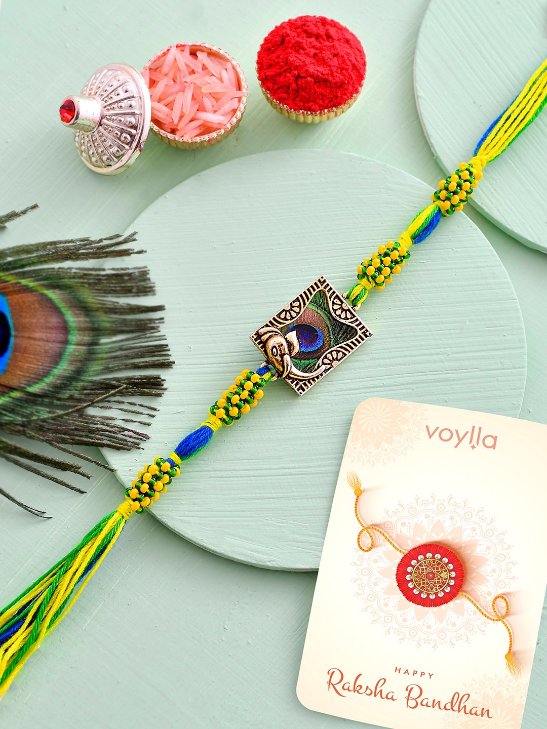 

Voylla Men Peacock Feather Thread Rakhi, Green