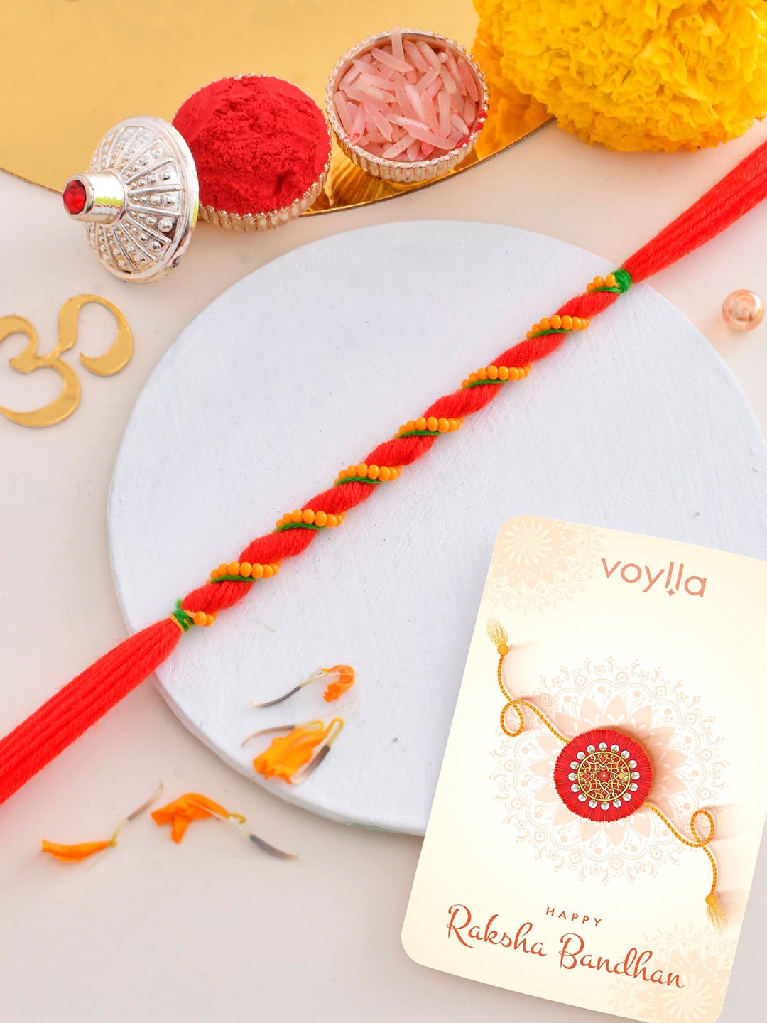 

Voylla Lightly Embellished Simple Thread Rakhi For Brother, Red