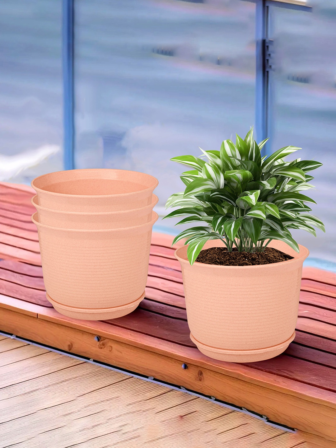 

Kuber Industries Peach 4 Pieces Textured Flower Pot Planters With Tray