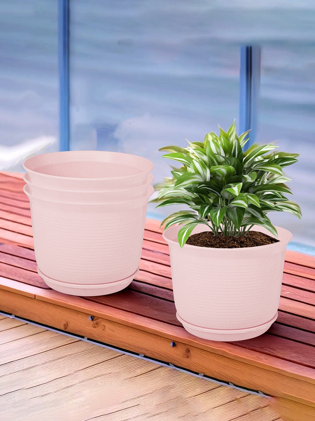 

Kuber Industries Pink 4 Pieces Textured Flower Pot Planters With Tray