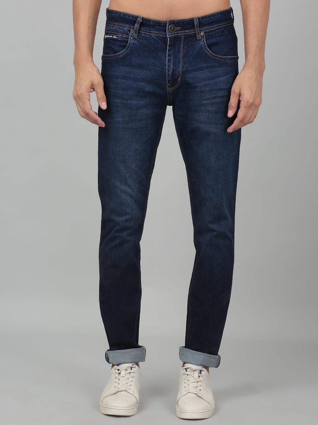 

Cantabil Men Mid-Rise Dark Shade Clean Look Cotton Jeans, Navy blue