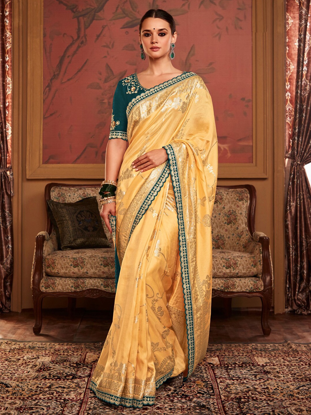

Mitera Ethnic Motifs Woven Design Sequinned Embellished Saree, Yellow