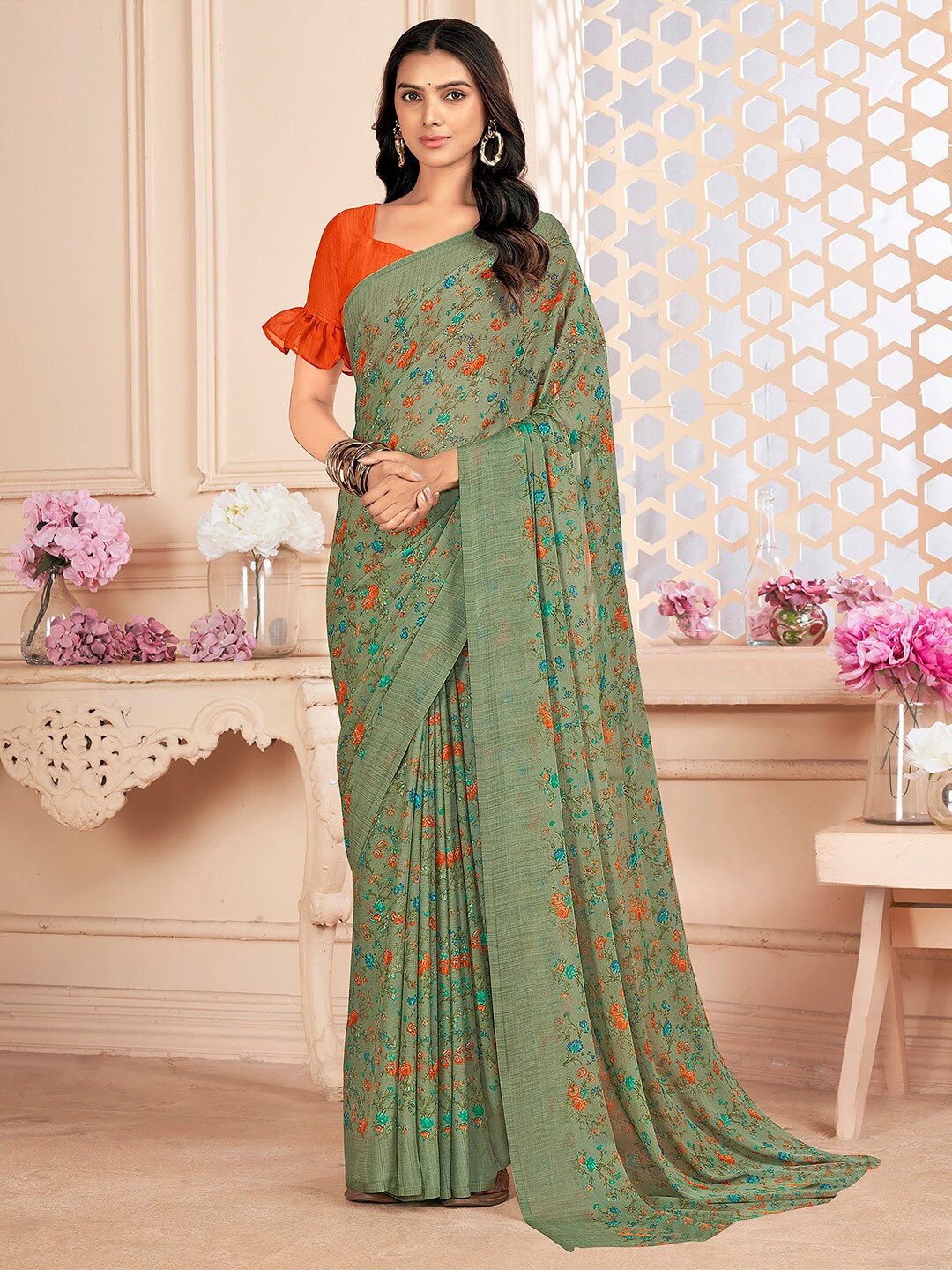 

Mitera Sea Green Floral Pure Chiffon Bagru Saree