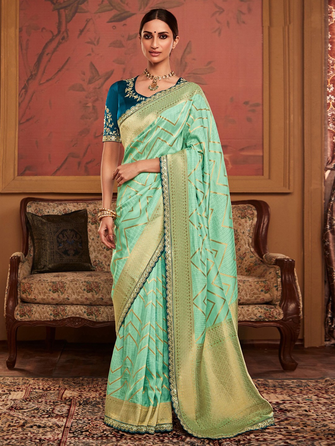

Mitera Sea Green Geometric Printed Embellished Border Sequinned Saree